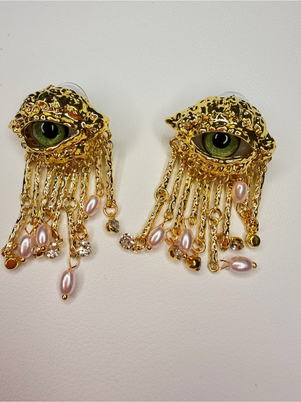Gold Eye Drop Earrings with Green Centers and Pearl Accents